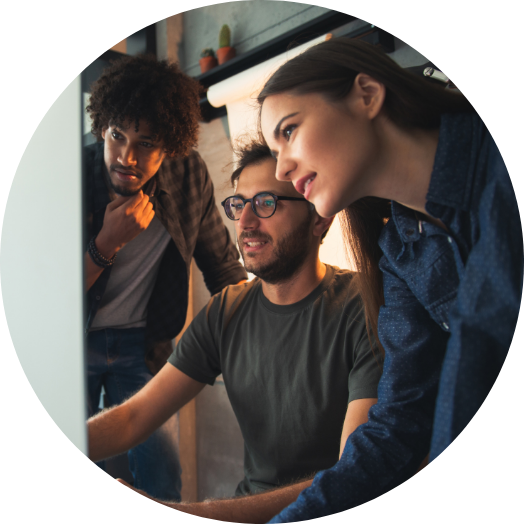 startup team looking at business loan interest rates on the computer